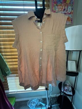 Sleeveless Button-Front Peplum Top in Blush